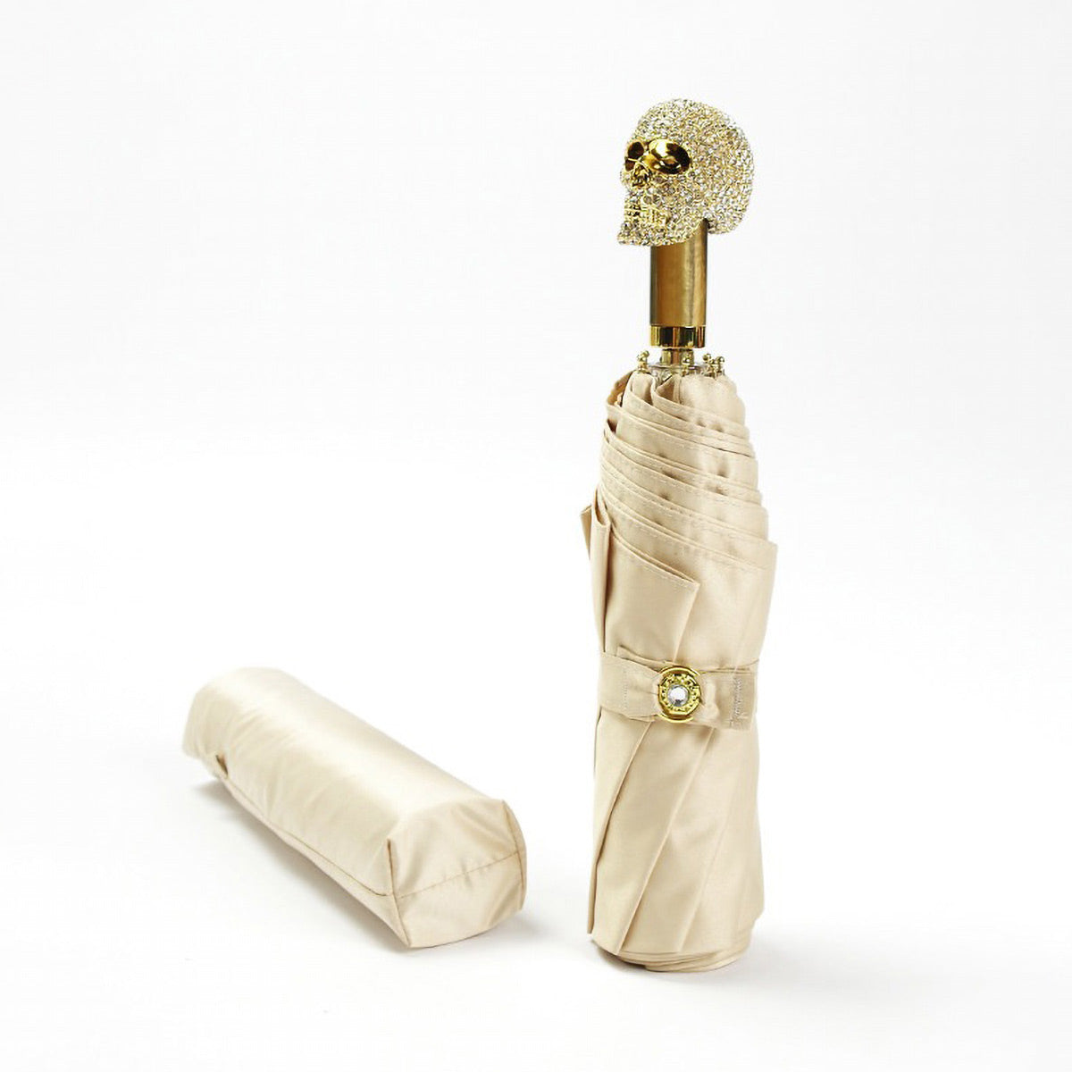 Off white luxury folding umbrella with crystal skull handle and storage case