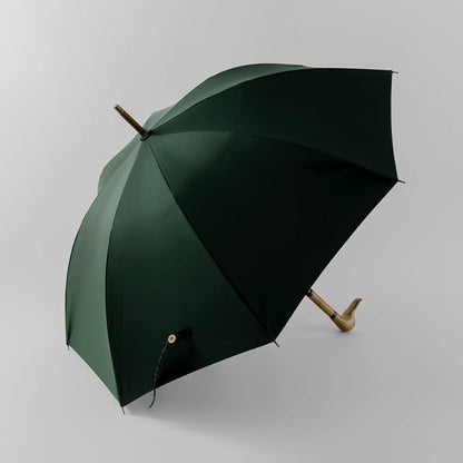 Elegant Duck Head Umbrella displaying Forest Green canopy and natural wood handle