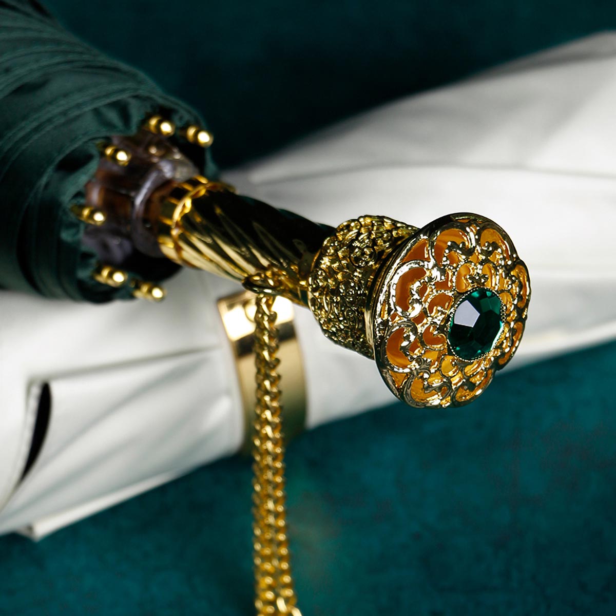 Elegant Dark Green Umbrella with Victorian Gold Handle Close-up