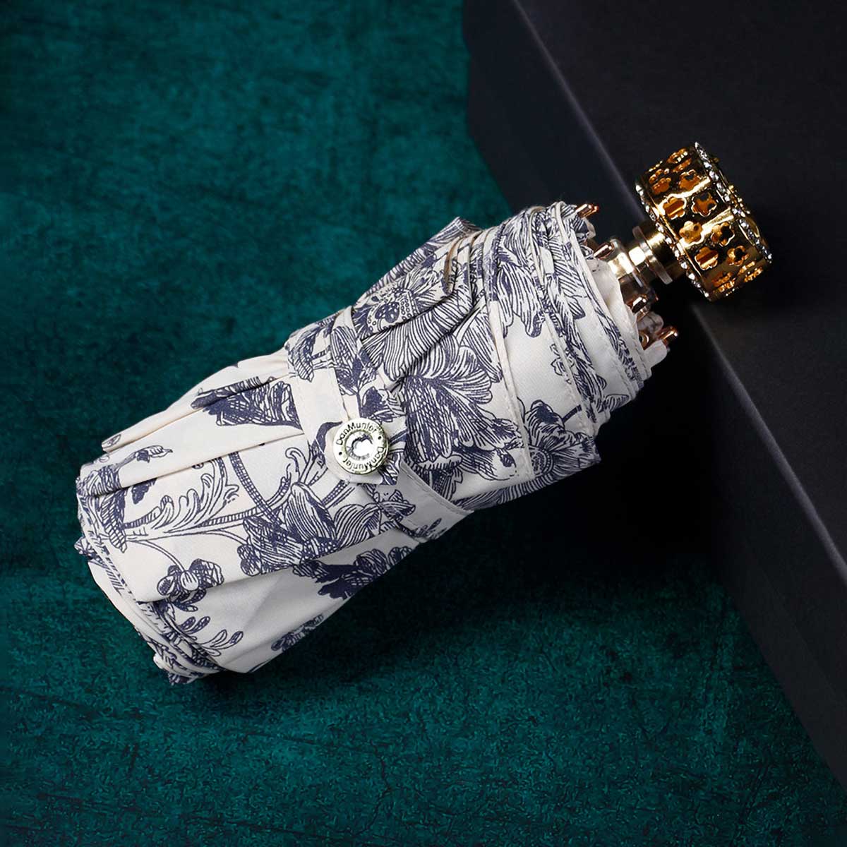 Folded small umbrella with flowers: stylish luxury accessory for women